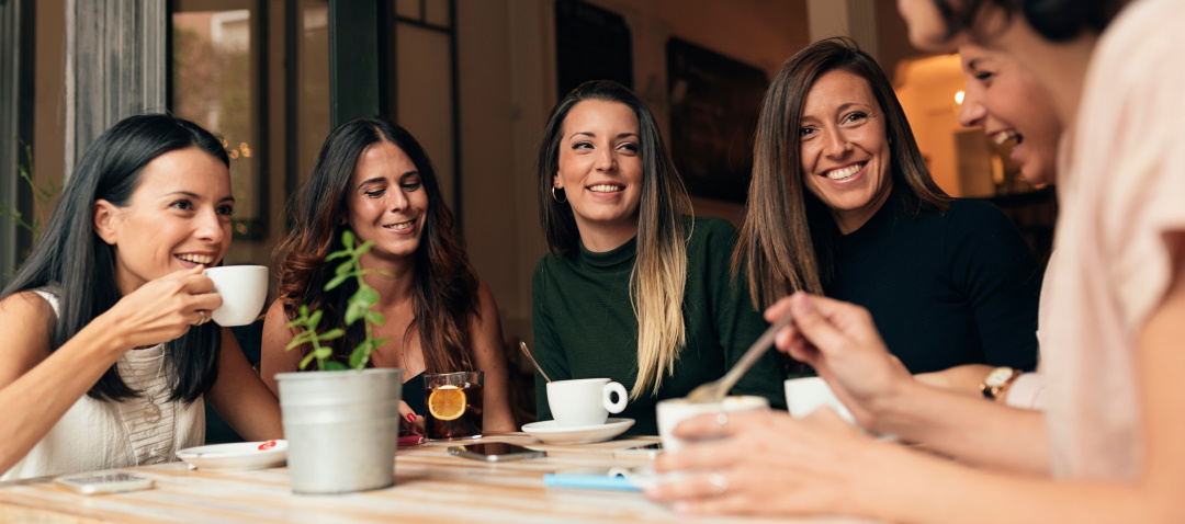 group of women having coffee group of women having coffee