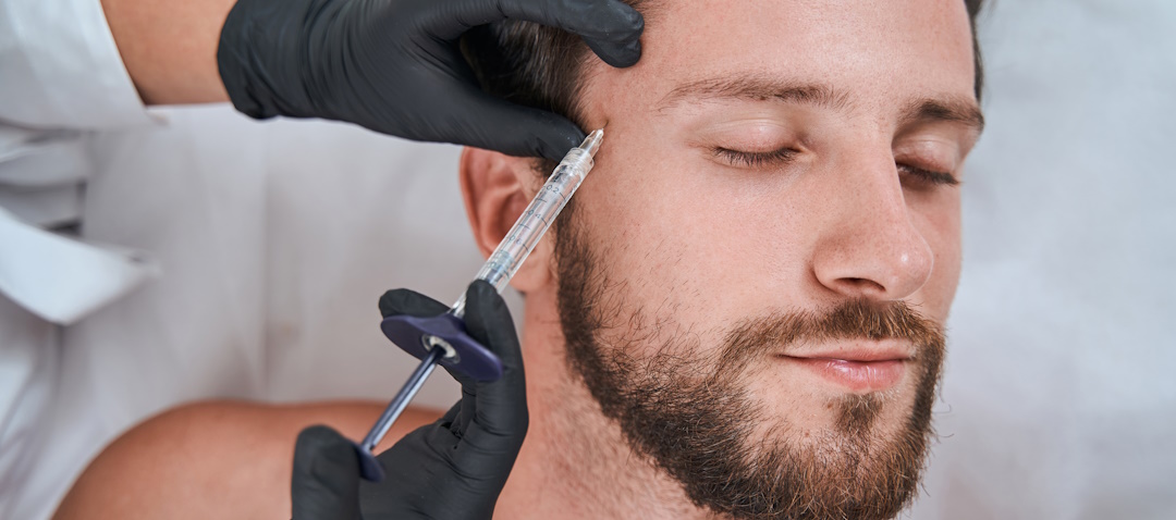 man receiving dermal fillers