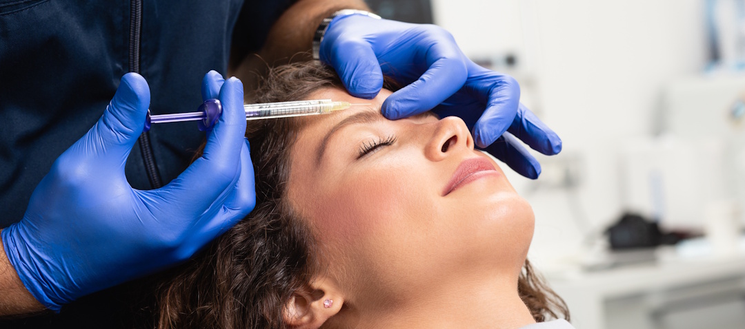 woman getting botox in forehead